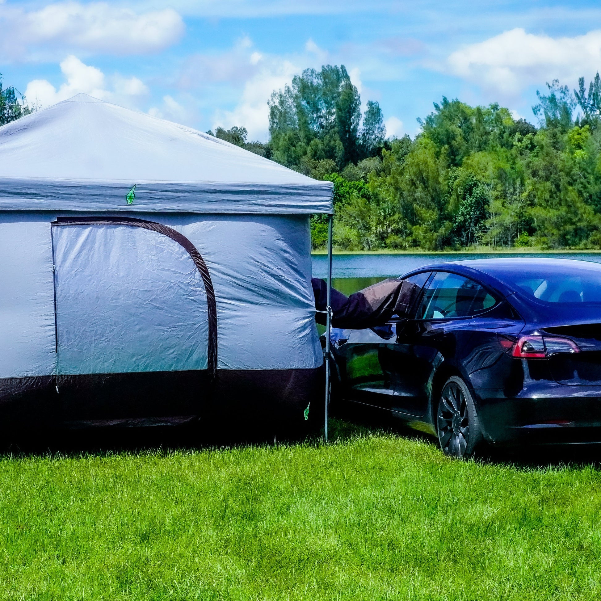 Tesla tent setup with Model Y for EV camping adventures. Perfect Tesla tent for electric vehicle camping gear setups. Designed for Tesla Model 3 and Model Y camping, this tent is ideal for outdoor experiences and car camping solutions. Enhance your Tesla camping setup with this versatile and easy-to-use tent for electric vehicle road trips.