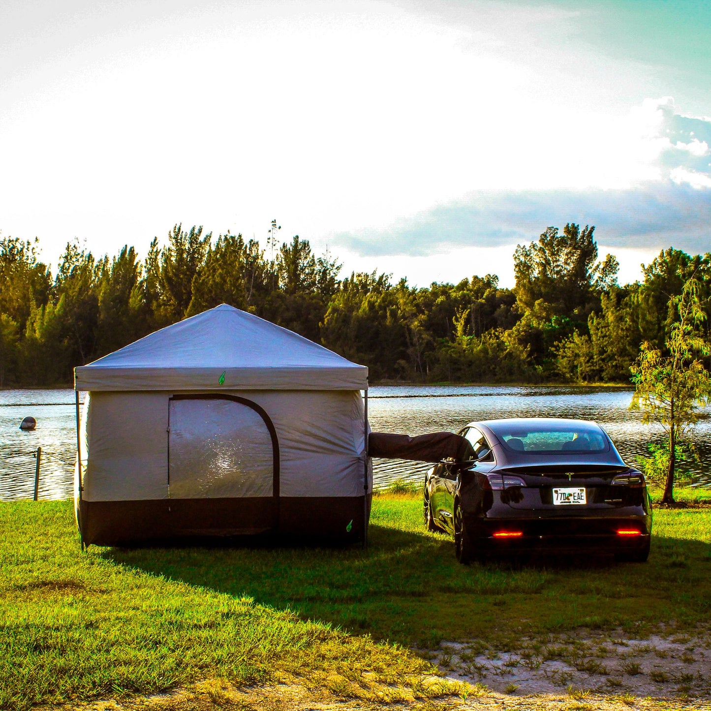 Tesla tent setup with Model Y for EV camping adventures. Perfect Tesla tent for electric vehicle camping gear setups. Designed for Tesla Model 3 and Model Y camping, this tent is ideal for outdoor experiences and car camping solutions. Enhance your Tesla camping setup with this versatile and easy-to-use tent for electric vehicle road trips.