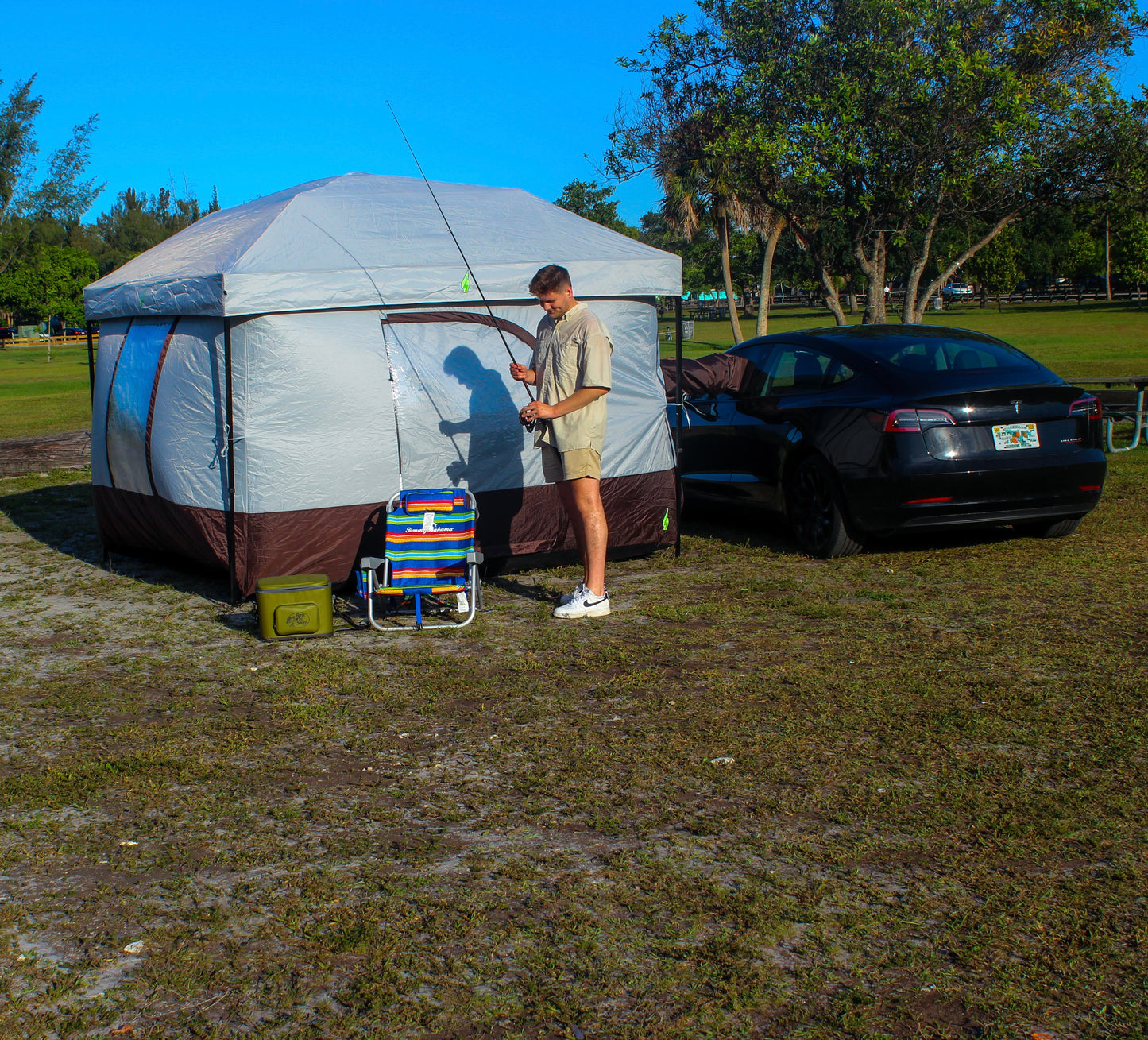 Tesla tent setup with Model Y for EV camping adventures. Perfect Tesla tent for electric vehicle camping gear setups. Designed for Tesla Model 3 and Model Y camping, this tent is ideal for outdoor experiences and car camping solutions. Enhance your Tesla camping setup with this versatile and easy-to-use tent for electric vehicle road trips.